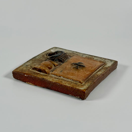 Armogres hand carved tile