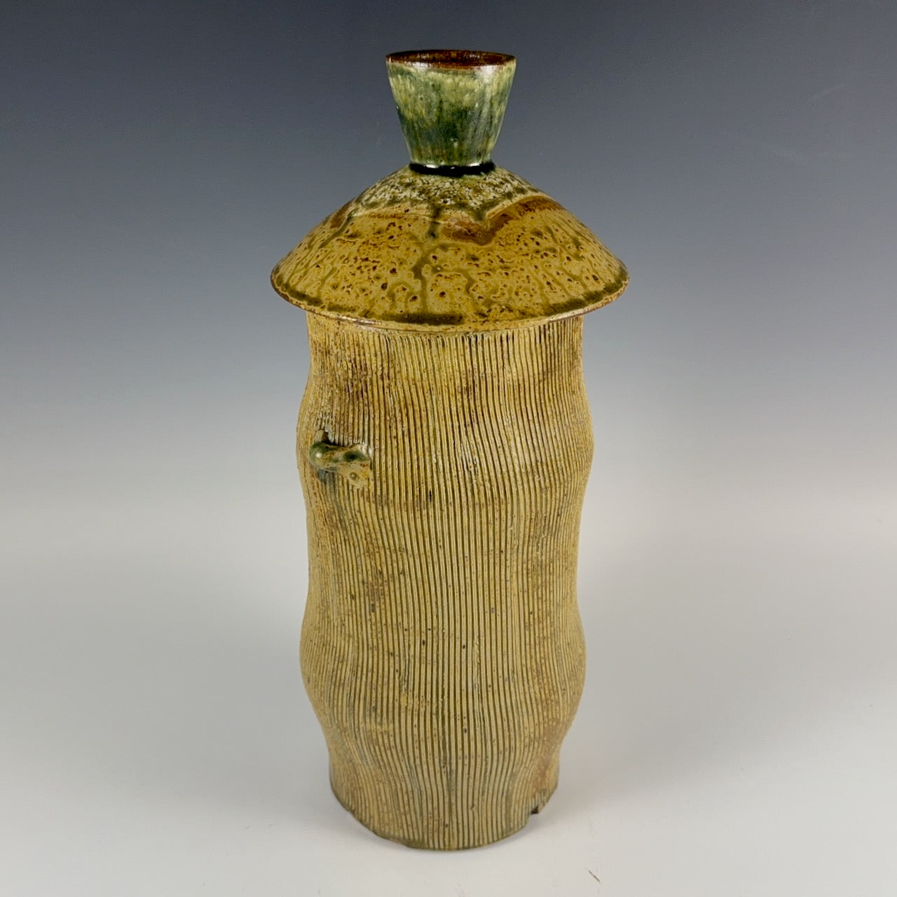 Robert Briscoe tall lidded jar