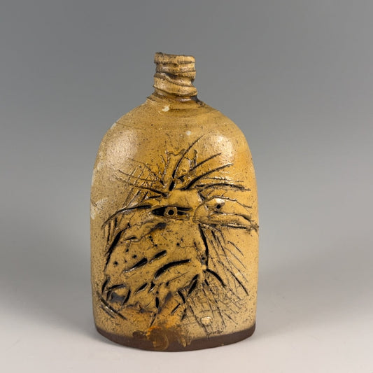 Ron Meyers bottle form with bird