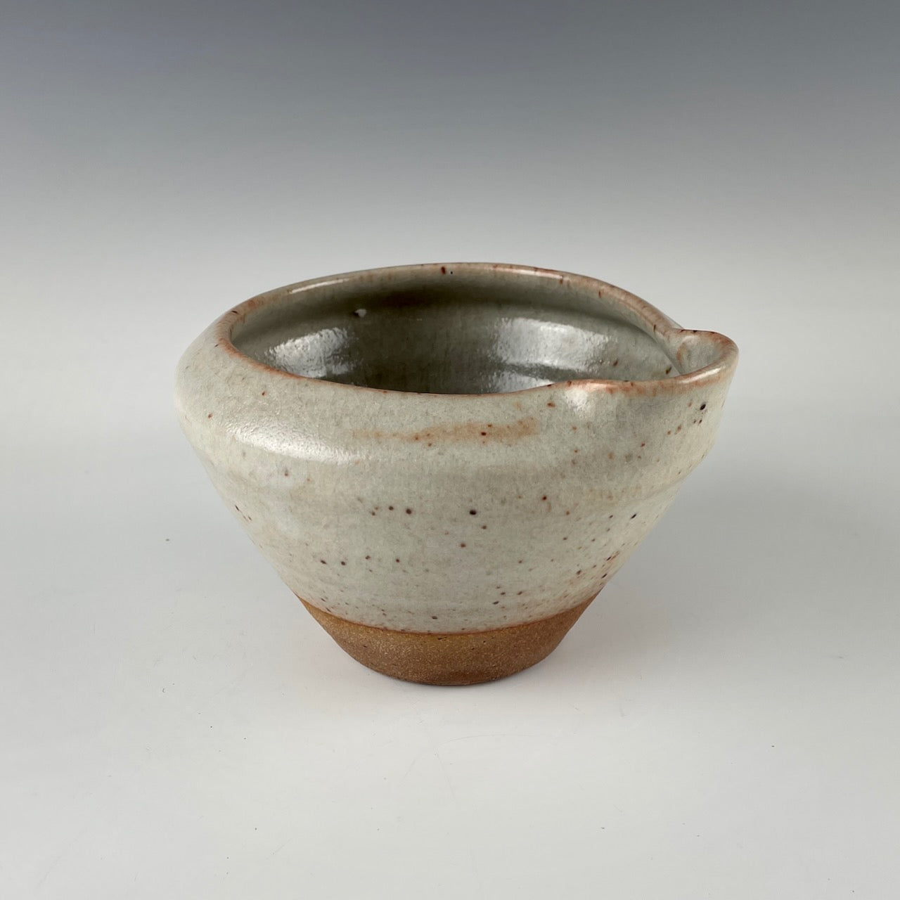 Guillermo Cuellar pouring pot